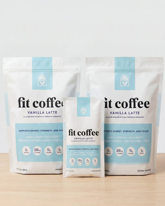 Two packages of fit coffee vanilla latte with one sample on a wooden surface with a white background